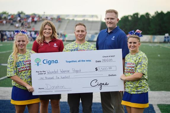 ​During the live broadcasted football game against Walton on Sept, 11, Etowah was presented with a large check of $1500. Principal Keith Ball decided to donate the $1500 check to the Wounded Warriors Project.