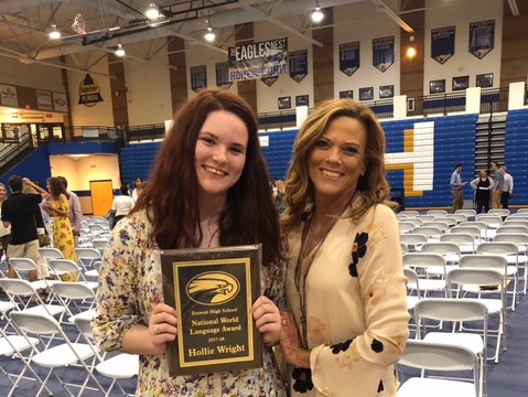 Hollie Wright (left) receiving award with mother