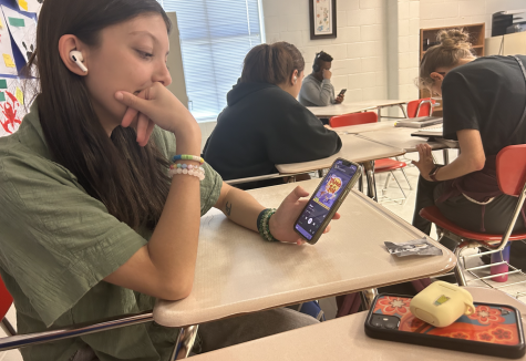 Pictured: Kylie Clay, senior, on AirBuds app. 